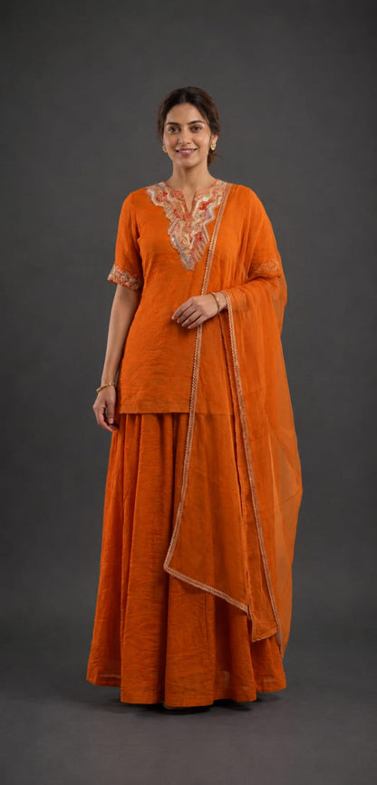 Orange kurta with embellished neckline and flare sharara