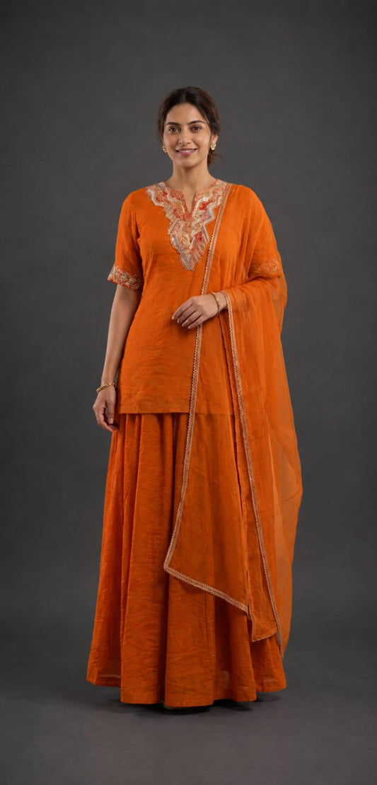 Orange kurta with embellished neckline and flare sharara