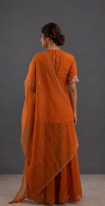 Orange kurta with embellished neckline and flare sharara