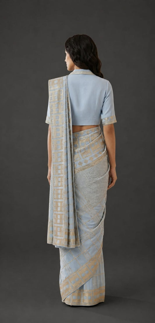 Powder Blue Saree with Geometric Gold Embellishments and Blazer-Collar Blouse