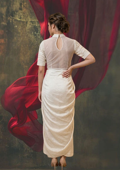 Elegant ivory-white ensemble with a soft, refined finish and subtle woven floral texture.